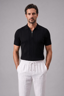 Men's ribbed knit polo featuring a structured collar, quarter-zip fastening and a tailored silhouette.