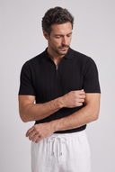 Men's ribbed knit polo featuring a structured collar, quarter-zip fastening and a tailored silhouette.