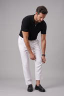Men's ribbed knit polo featuring a structured collar, quarter-zip fastening and a tailored silhouette.