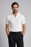 Men's ribbed knit polo featuring a structured collar, quarter-zip fastening and a tailored silhouette.