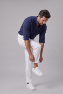 Men's grandad collar shirt featuring a half-button placket, rolled sleeves, curved hem and a clean minimalist design.