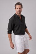 Men's grandad collar shirt featuring a half-button placket, rolled sleeves, curved hem and a clean minimalist design.