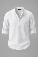 Men's grandad collar shirt featuring a half-button placket, rolled sleeves, curved hem and a clean minimalist design.