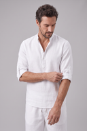 Men's grandad collar shirt featuring a half-button placket, rolled sleeves, curved hem and a clean minimalist design.