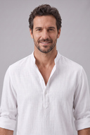 Men's grandad collar shirt featuring a half-button placket, rolled sleeves, curved hem and a clean minimalist design.
