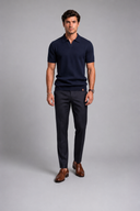 Men’s premium textured knit polo with minimalist open-collar design and refined tailored fit by Thorvyn