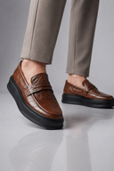 Men’s premium modern platform penny loafers with minimalist luxury silhouette by Thorvyn