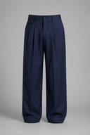 Men’s premium tailored wide-leg trousers with pleated front and minimalist luxury silhouette by Thorvyn