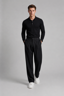 Men’s premium tailored wide-leg trousers with pleated front and minimalist luxury silhouette by Thorvyn