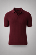 Men’s premium black ribbed knit polo shirt styled with tailored trousers and brown leather loafers by Thorvyn