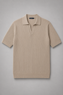 Men’s premium black ribbed knit polo shirt styled with tailored trousers and brown leather loafers by Thorvyn