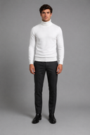 Premium men’s white roll neck jumper designed for refined British style, smart layering, and sophisticated cold-weather dressing.