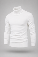 Men’s premium white roll neck knitted jumper styled with tailored trousers and black leather boots by Thorvyn