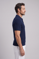 Men's textured knit polo featuring an open collar, vertical textured knit panels and ribbed trims.