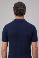 Men's textured knit polo featuring an open collar, vertical textured knit panels and ribbed trims.