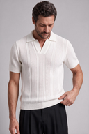 Men's textured knit polo featuring an open collar, vertical textured knit panels and ribbed trims.