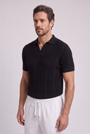 Men's textured knit polo featuring an open collar, vertical textured knit panels and ribbed trims.