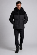 Men’s premium insulated puffer jacket with structured hood and modern minimalist design by Thorvyn