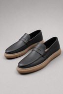 Men’s premium minimalist penny loafers with refined luxury casual silhouette by Thorvyn