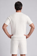 Men's matching cable knit set featuring a crew neck short-sleeve knit top with coordinating tailored knit shorts.