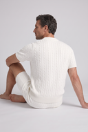 Men's matching cable knit set featuring a crew neck short-sleeve knit top with coordinating tailored knit shorts.