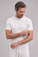 Men's matching cable knit set featuring a crew neck short-sleeve knit top with coordinating tailored knit shorts.