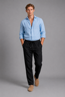 Men’s premium white linen trousers with relaxed tailored fit and adjustable drawstring waistband by Thorvyn 