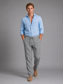 Men’s premium white linen trousers with relaxed tailored fit and adjustable drawstring waistband by Thorvyn 