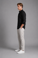 Men’s premium white linen shirt with rolled sleeves and minimalist tailored design by Thorvyn 