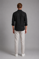 Men’s premium white linen shirt with rolled sleeves and minimalist tailored design by Thorvyn 