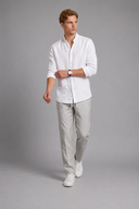 Men’s premium white linen shirt with rolled sleeves and minimalist tailored design by Thorvyn 