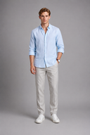 Men’s premium white linen shirt with rolled sleeves and minimalist tailored design by Thorvyn 