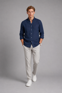 Men’s premium white linen shirt with rolled sleeves and minimalist tailored design by Thorvyn 