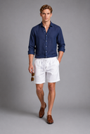 Men’s premium white linen shorts with relaxed tailored fit and adjustable drawstring waistband by Thorvyn 