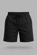 Men’s premium white linen shorts with relaxed tailored fit and adjustable drawstring waistband by Thorvyn 