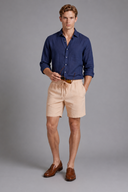 Men’s premium white linen shorts with relaxed tailored fit and adjustable drawstring waistband by Thorvyn 