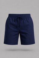 Men’s premium white linen shorts with relaxed tailored fit and adjustable drawstring waistband by Thorvyn 
